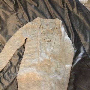 A new day laced up sweater